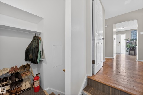 Hardwood flooring in the hallway - 5216 104A Street, Edmonton, AB - Indoor Photo Showing Other Room