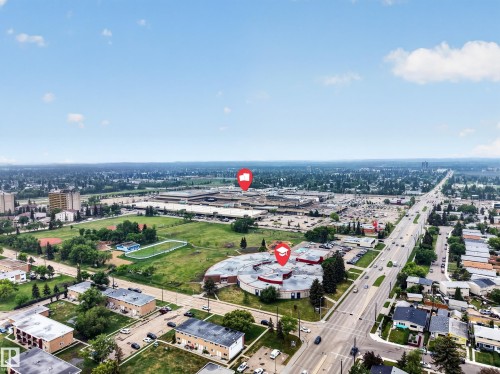 Aerial perspective showcasing a sprawling urban landscape with extensive tree coverage - 5216 104A Street, Edmonton, AB - Outdoor With View