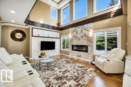 74-53302 261 Range Road, Rural Parkland County, AB - Indoor Photo Showing Living Room With Fireplace
