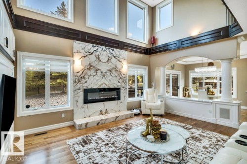 74-53302 261 Range Road, Rural Parkland County, AB - Indoor Photo Showing Living Room With Fireplace