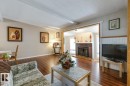 6303 89 Avenue, Edmonton, AB  - Indoor Photo Showing Living Room With Fireplace 