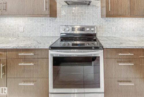 5803 32 Street Ne, Rural Leduc County, AB - Indoor Photo Showing Kitchen With Upgraded Kitchen