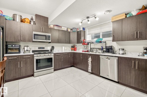 5803 32 Street Ne, Rural Leduc County, AB - Indoor Photo Showing Kitchen With Double Sink