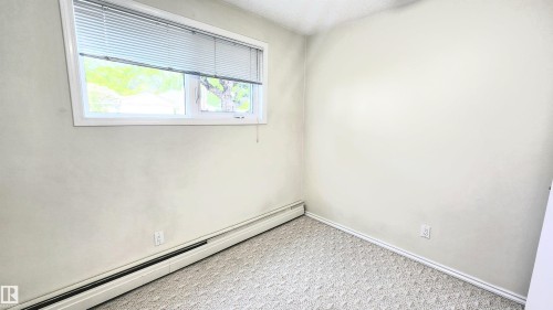 Neutral wall color with white trim - 8824 90 Street, Edmonton, AB 