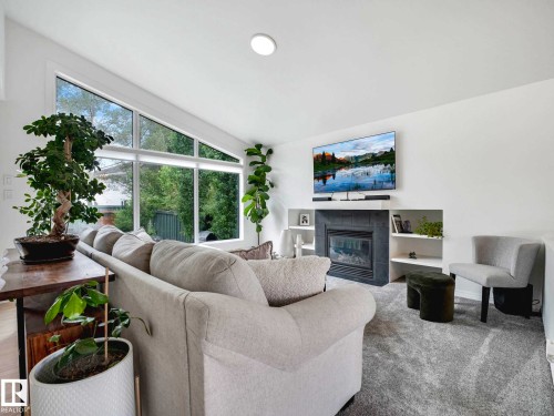 920 Haliburton Road, Edmonton, AB - Indoor Photo Showing Living Room With Fireplace