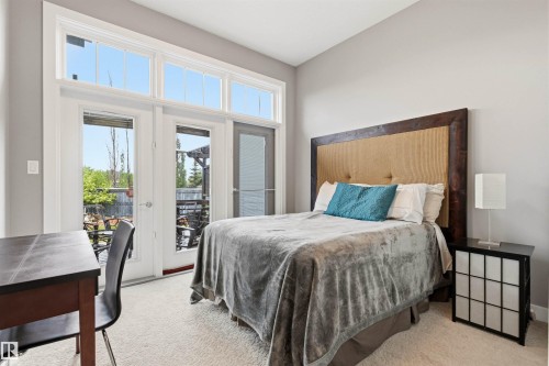 Double French doors with transom windows - 5709 Mcluhan Bay, Edmonton, AB 