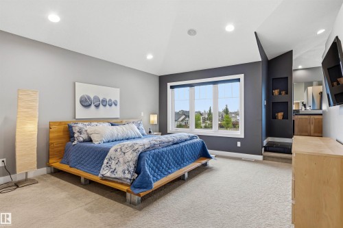 Carpeted room featuring a vaulted ceiling with recessed lighting - 5709 Mcluhan Bay, Edmonton, AB 