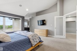Vaulted ceilings and large windows create an open atmosphere - 