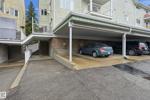 Covered parking structure offering shelter for vehicles - 33 9914 80 Avenue, Edmonton, AB - Outdoor