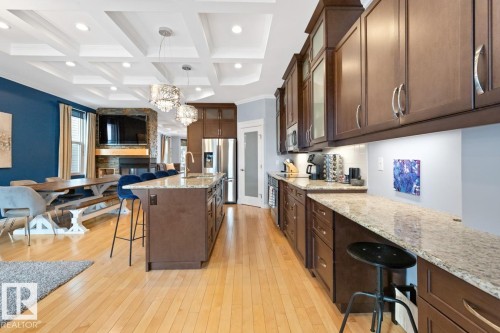 Kitchen With Extended Counter Which Could Be Used For Computer/Work Area. - 10216 89 Street, Edmonton, AB - Indoor Photo Showing Kitchen With Upgraded Kitchen