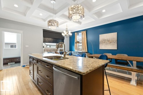 View Of Kitchen And Mud Room Which Has Access To The Back Door. - 10216 89 Street, Edmonton, AB - Indoor Photo Showing Kitchen With Double Sink