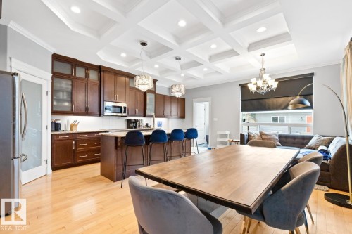 View From Eating Area Looking Into Kitchen And Family Room. - 10216 89 Street, Edmonton, AB - Indoor Photo Showing Dining Room