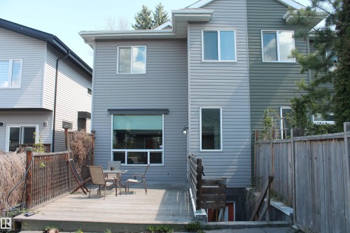 Exterior Back Of the House. Good Size Deck & Entrance Into The Basement. - 10216 89 Street, Edmonton, AB - Outdoor With Deck Patio Veranda With Exterior