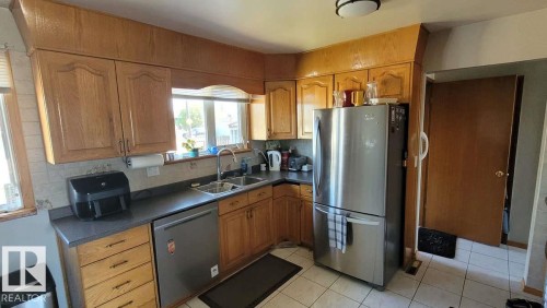 7220 131A Avenue, Edmonton, AB - Indoor Photo Showing Kitchen With Double Sink