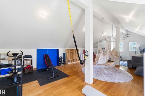 Spacious attic conversion featuring vaulted ceilings and light wood flooring - #17 A 15031 Twp Road 462, Rural Wetaskiwin County, AB - Indoor Photo Showing Other Room