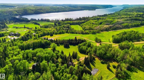 Expansive natural landscape featuring a large body of water, lush green trees, rolling hills, and open fields - #17 A 15031 Twp Road 462, Rural Wetaskiwin County, AB - Outdoor