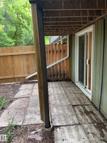 Ground-level patio area featuring concrete pavers - 167 Ridgewood, St. Albert, AB - Outdoor With Deck Patio Veranda