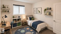 Bedroom featuring light-colored walls and carpet flooring - 