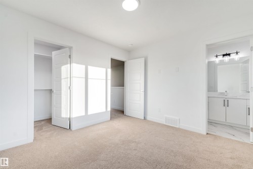 Neutral tone-on-tone carpet flooring - 1511 211 Street Nw, Edmonton, AB 