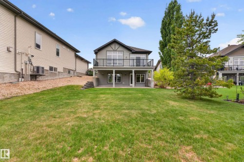 Expansive grassy yard with mature trees - 624 Cantor Landing Landing, Edmonton, AB 