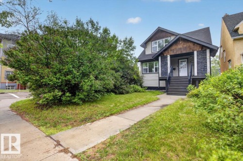 Craftsman-style exterior with stone veneer and cedar shake accents - 10958 88 Avenue, Edmonton, AB 