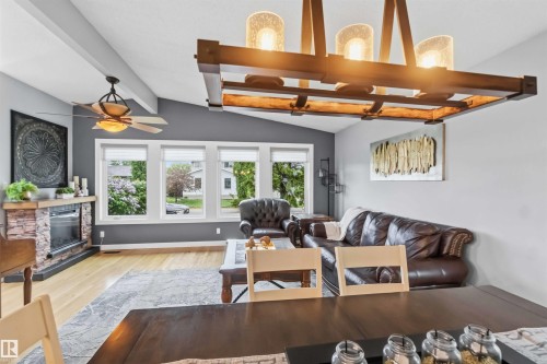 Vaulted ceilings featuring exposed beams and a ceiling fan - 11431 144 Avenue, Edmonton, AB 