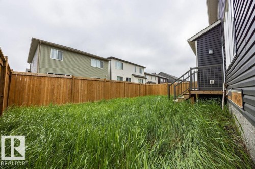 Fenced backyard with wood privacy fencing - 2031 207 Street, Edmonton, AB 