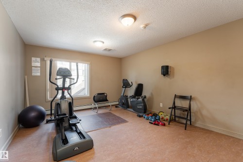 103 13710 150 Avenue, Edmonton, AB - Indoor Photo Showing Gym Room
