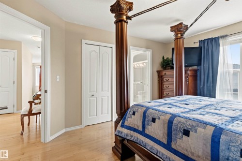 Hardwood-style flooring throughout - 32 Lamplight Bay, Spruce Grove, AB 