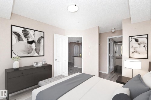 Bedroom featuring light-toned walls and wood-finish flooring - 108 530 Watt Boulevard, Edmonton, AB 