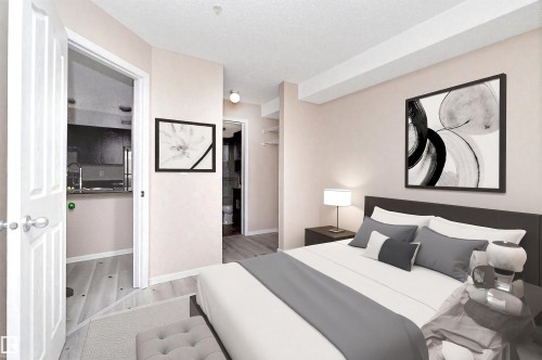 Bedroom featuring wood-finish flooring and a neutral color palette - 108 530 Watt Boulevard, Edmonton, AB 