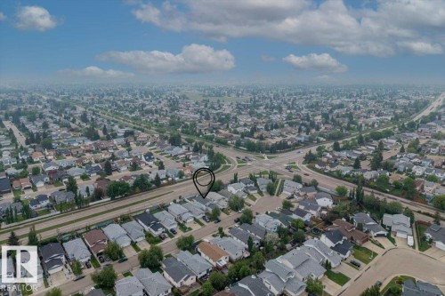 Residential neighborhood with paved streets and mature trees - 8103 154 Avenue, Edmonton, AB 