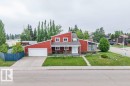 Angular architecture with vibrant red siding and a stone facade - 10503 25 Avenue, Edmonton, AB 