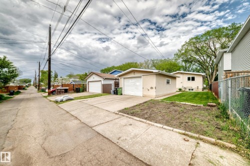 Rear alley access featuring detached garages - 12022 62 Street, Edmonton, AB 