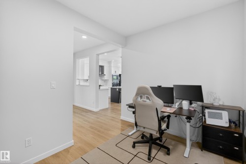 Open concept interior featuring light wood-finish flooring - 17023 45 Street, Edmonton, AB 
