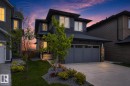 Modern facade with dark siding and stone accents - 17023 45 Street, Edmonton, AB 