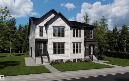 Contemporary duplex exterior featuring white siding and dark trim accents - 10985 130 Street, Edmonton, AB 