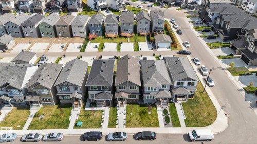 Aerial perspective showcasing a residential neighborhood with varied architectural styles - 1213 16A Street, Edmonton, AB 