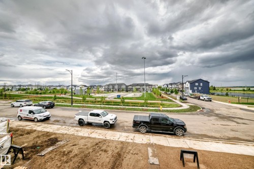 Developing neighborhood featuring a variety of residential structures and a broad streetscape with sidewalks - 1210 Stoneside Road, Sherwood Park, AB - Outdoor With View