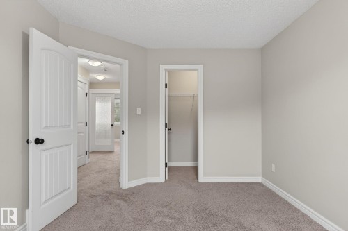 Neutral-toned carpeting throughout - 64 South Creek Wynd, Stony Plain, AB 