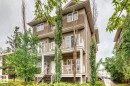 Multi-level building with stucco exterior and white trim windows - 4 11917 103 Street, Edmonton, AB 