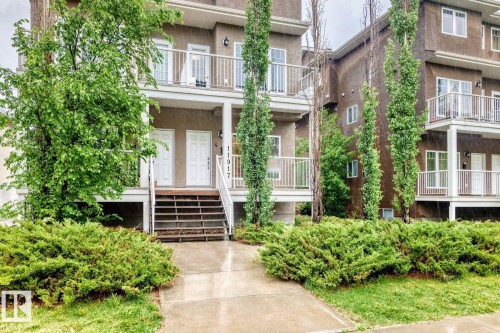 Multi-level residential building featuring a stucco exterior - 4 11917 103 Street, Edmonton, AB 