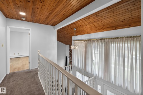 Vaulted wood-paneled ceiling with recessed lighting - 14808 55 Street, Edmonton, AB 