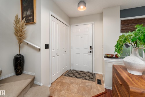 Entryway with front closet and tile flooring - 5964 South Terwillegar Boulevard, Edmonton, AB 