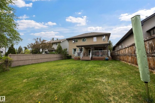 Backyard and house. - 57 Homestead Crescent, Edmonton, AB 