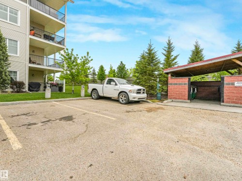 Multi-story building featuring multiple private balconies with black railings - 1103 2 Augustine Crescent, Sherwood Park, AB 