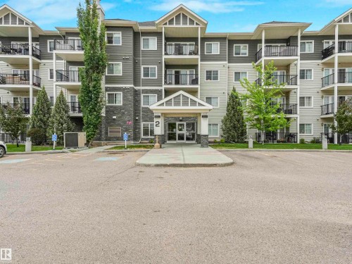 Modern multi-story building featuring a stone and siding exterior - 1103 2 Augustine Crescent, Sherwood Park, AB 