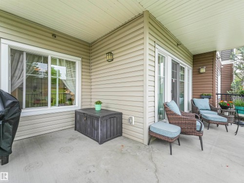 Covered outdoor patio with a concrete surface - 1103 2 Augustine Crescent, Sherwood Park, AB 