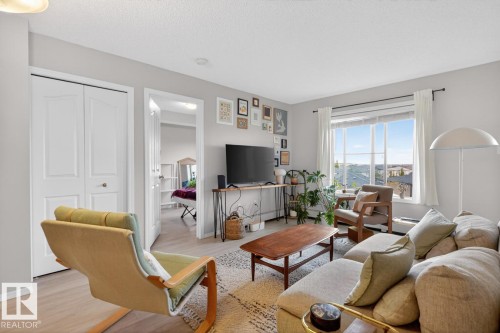 414 1060 Mcconachie Boulevard, Edmonton, AB - Indoor Photo Showing Living Room