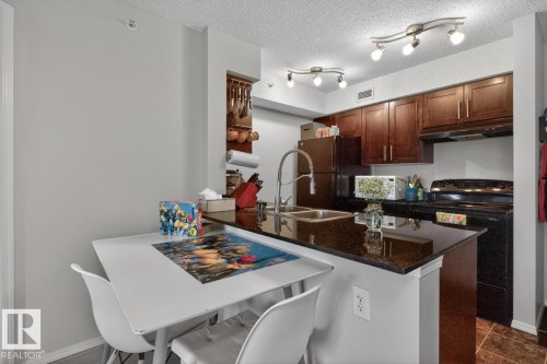 414 1060 Mcconachie Boulevard, Edmonton, AB - Indoor Photo Showing Kitchen With Double Sink